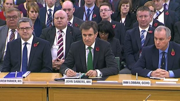 Andrew Parker the head of M15 (left), John Sawers the head of M16 and Iain Lobban GCHQ director are seen attending an Intelligence and Security Committee hearing at Parliament.