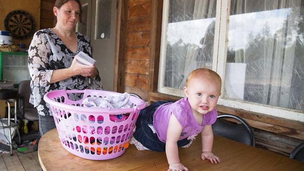 Debbie Orr and her 1-year-old Sammi at her property near Tara, Queensland.