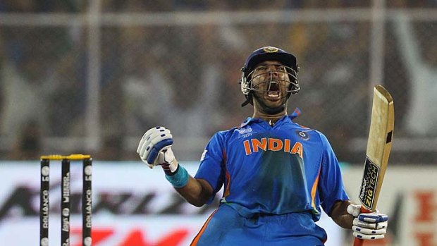 Singh on song: Yuvraj Singh celebrates after hitting India's winning runs in the tense quarter-final against Australia.