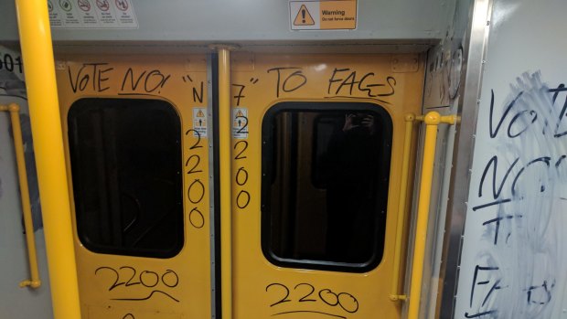 "Vote no to fags": A train carriage in Sydney was vandalised with homophobic graffiti.