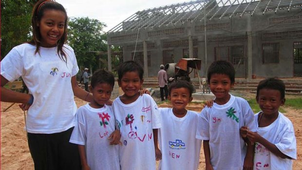 On a mission: Koky Saly is working to build schools for the children (above) of Cambodia from where he fled to Australia as a child.