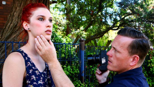 A moment in fashion history ... photographer and blogger Scott Schuman composes an image with Tiffany Hague, 22.