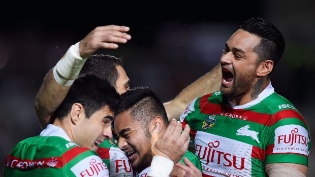 Bunnies jump for joy: The Rabbitohs celebrate a try in their win over North Queensland.
