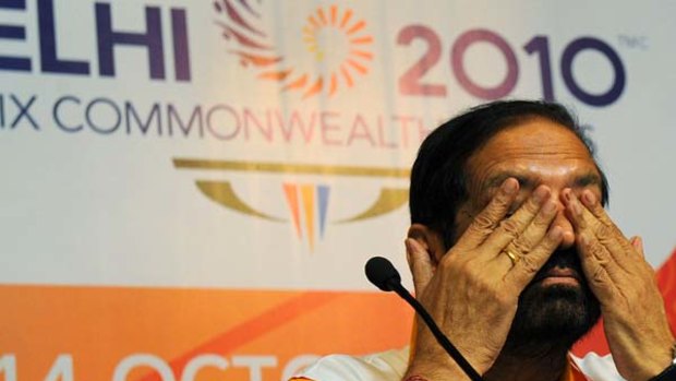 Feeling the strain . . . Suresh Kalmadi takes questions from journalists during a press conference in New Delhi.