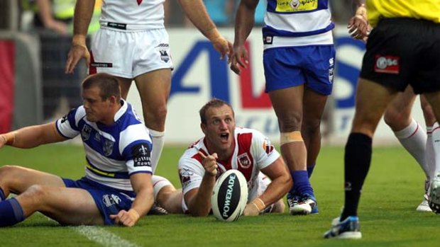 Please, sir ... Dragons centre Mark Gasnier appeals for a try.