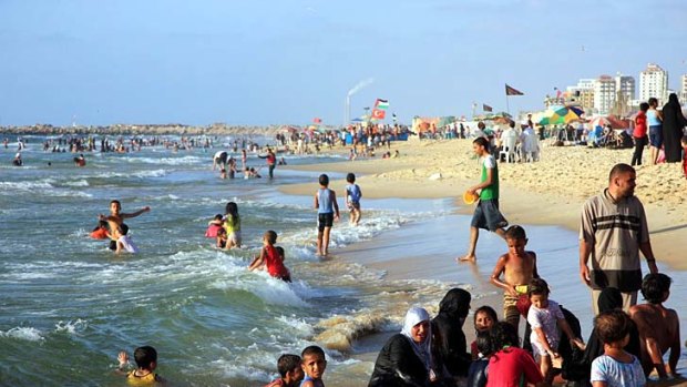 Jobs and training . . . Gaza's first five-star hotel is beside a Hamas training camp and overlooks the Mediterranean.