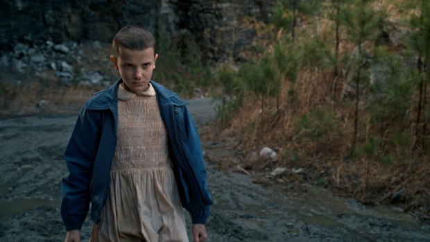 Eleven, played by Millie Bobby Brown, in <i>Stranger Things</i>.