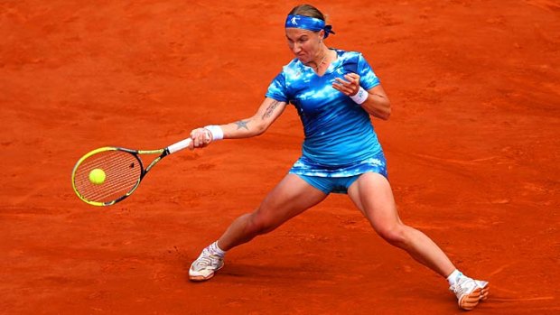 Svetlana Kuznetsova plays a forehand during her match against Angelique Kerber of Germany.