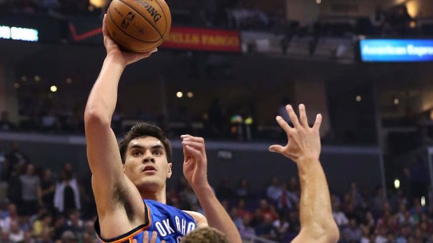 Oklahoma City Thunder rookie centre Steven Adams shoots against the LA Clippers.