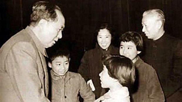 Liu Yuan stands to the right of Mao Tse Tung as the Chinese leader greets his family in the late 1950s or early 1960s.