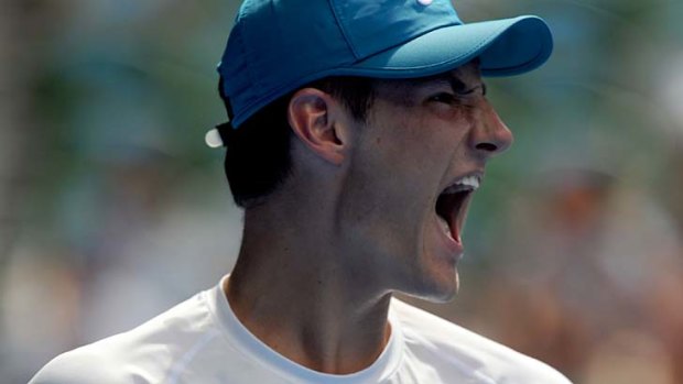 Meeting his match ... Tomic was surprised by Daniel Brands.