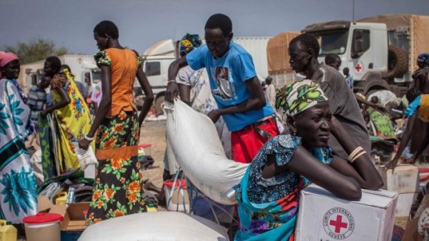 South Sudanese receive aid in January this year in Minkammen, near Bor.