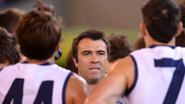 Geelong coach Chris Scott is playing down his team's chances in the forthcoming game against Essendon, the only other unbeaten team this season.