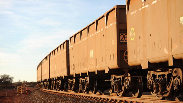 A Fortescue Metals train being loaded with iron ore in the Pilbara region of Western Australia.