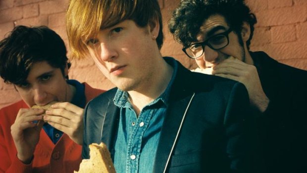 Alex Trimble (centre), of Two Door Cinema Club, has been hospitalised with 'a chronic stomach complaint'.