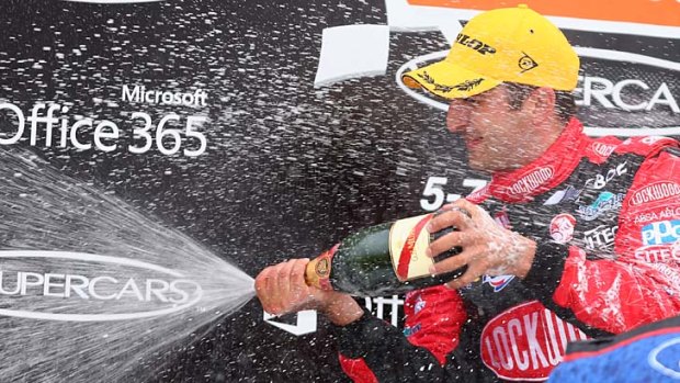 Time to celebrate: Fabian Coulthard claimed his second win of the weekend at Symmons Plains in Tasmania.