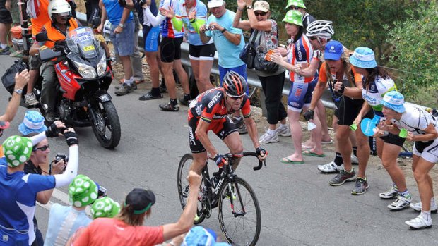 On top: Cadel Evans powers away in Thursday's stage of the Tour Down Under.