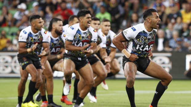 Cultural pride: Indigenous players perform before the All-Stars match.