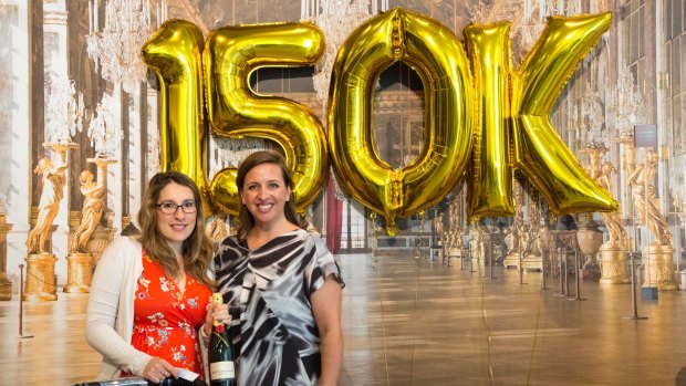 The 150,000th visitor to the Versailles: Treasures from the Palace exhibition, Amelia Dimitrovski, 32, from Gungahlin celebrating the milestone with National Gallery of Australia assistant director Alison Wright.