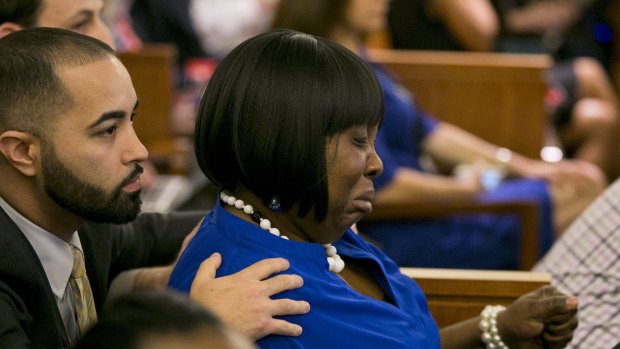 Fist pump ... Ursula Ward, mother of the victim, reacts to the guilty verdict for former NFL player Aaron Hernandez during his murder trial.
