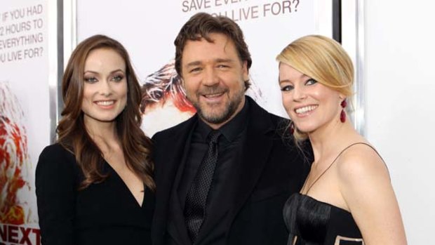"I have to do this movie" ... Russell Crowe with co-stars Olivia Wilde and Elizabeth Banks at the premiere of The Next Three Days.