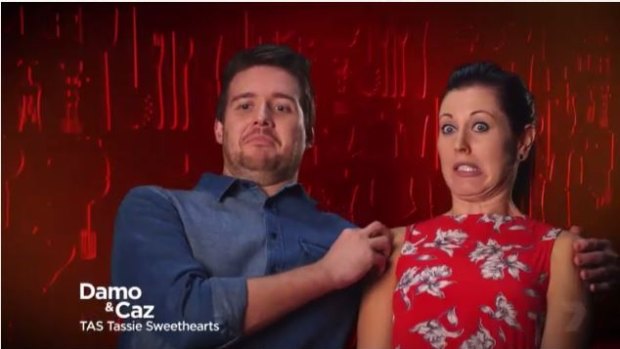 Trying to stay out of Josh's firing line are sweethearts Damo and Caz.