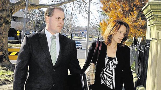 FORTY-NINE CHARGES: Australian Federal Police agent Ben Base and Department of Public Prosecutions' Katriona Musgrove enter court. <i>Photo: Steve Gosch/Central Western Daily</i>