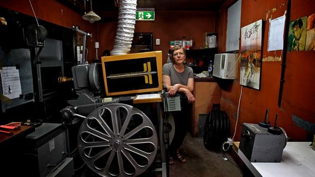 Reeling back the years &#8230; Dr Lisa Milner at the Bowraville picture theatre, once a segregated cinema that has been restored by residents into a theatre space.