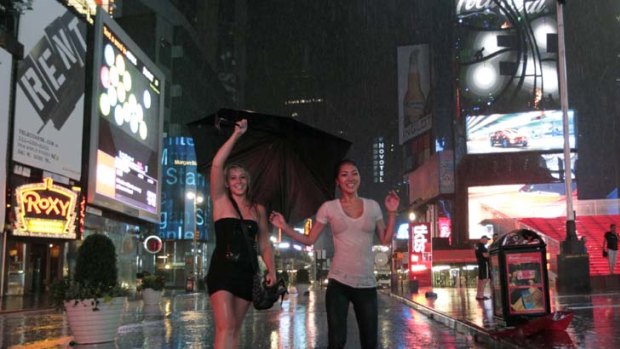 Revellers brave the weather in New York City.