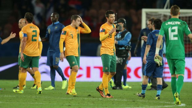Heads down: the Socceroos have plenty to think about ahead of their next test against Canada.