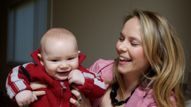 Belinda Burton, with son Henry, was thankful for her private health insurance cover during her pregnancy.