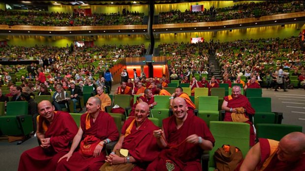 Buddhist Monks share a laugh before his Holiness The Dalai Lama appears to speak at his talk ' Sharing A Conversation With The Dalai Lama' at the Melbourne Convention Centre.