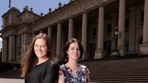 New Nationals MPs Steph Ryan (L) and Emma Kealy pose for a photo at Parliament House on December 12, 2014 