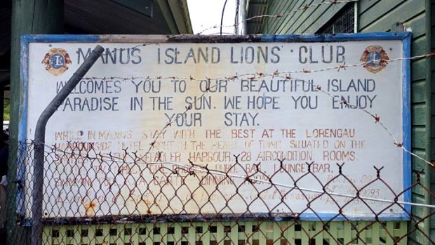 Inadequate care: A Manus Island Lions Club 'welcome' sign greets arrivals at the airport.