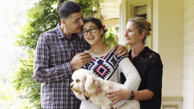 Safe: Wally Muhieddine with his wife, Suzanne, are reunited with daughter Krystal.