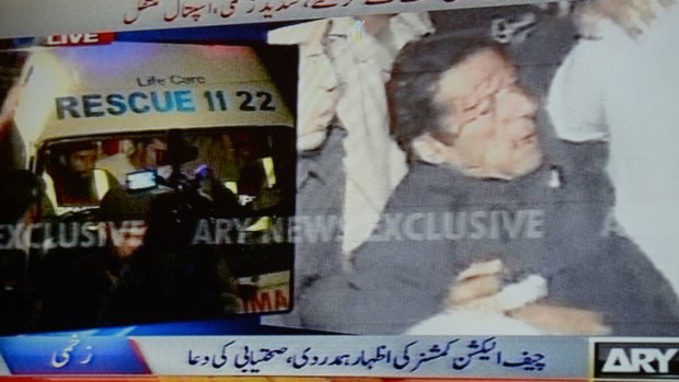 TV footage shows Imran Khan immediately after his fall.