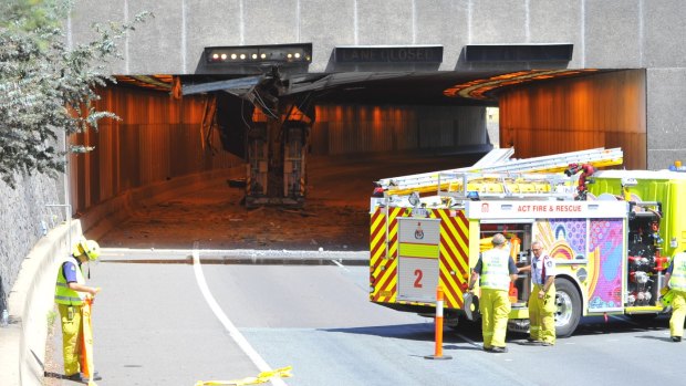ACT roads minister Mick Gentleman said the 4.9-metre high Acton Tunnel was not required to have its height signposted.