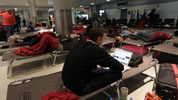 Passengers at New York's John F. Kennedy International Airport remain stranded.