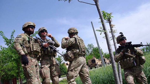 Hand over: Afghan forces are gradually taking over security responsibility as US-led international forces gradually scale down.