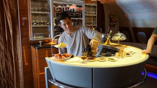 Travel blogger Sam Huang uses a loophole to land an epic first-class journey on Emirates.