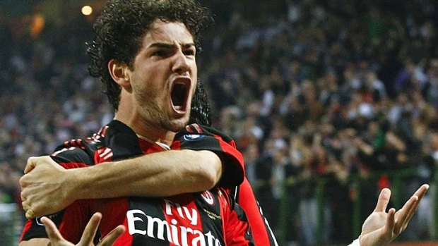 AC Milan's Pato celebrates after scoring against Inter Milan.