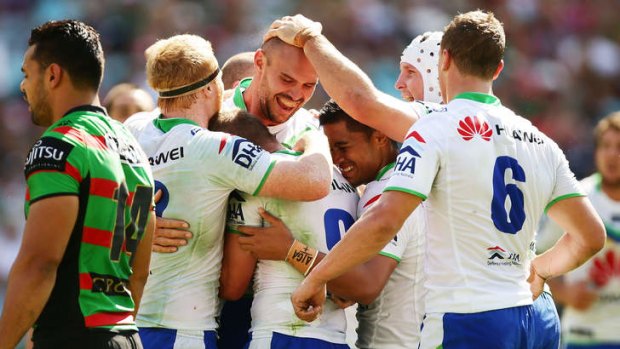 Historic win: Canberra's Dane Tilse celebrates after scoring a try against South Sydney.