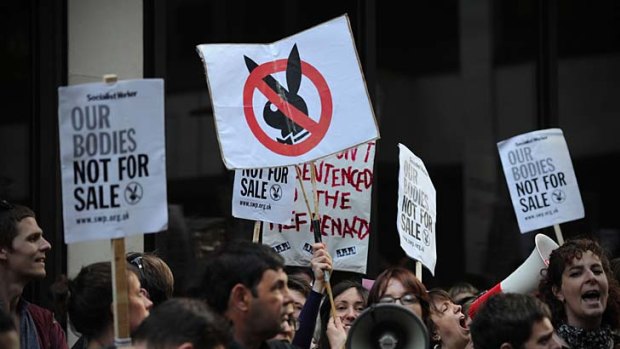 Protesters takes part in a demonstration against the opening of the Playboy Club on Saturday.