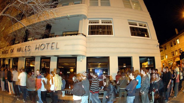Patrons queue outside the Prince of Wales in St Kilda before a live gig.