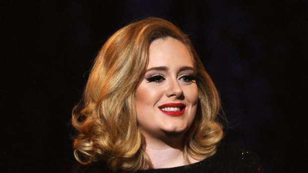 Adele ... suing French magazine.