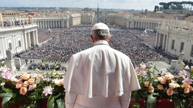Pope Francis delivers his Urbi et Orbi message from the main balcony of St. Peter's Basilica.