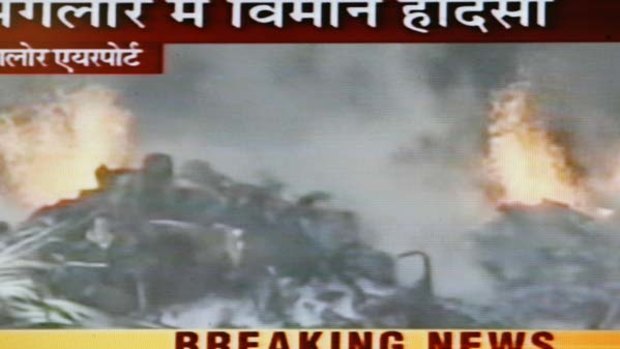 This frame from television shows burning wreckage of an Air India aircraft which crashed at Mangalore.