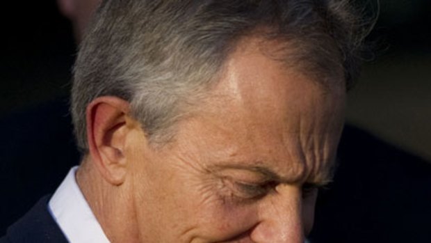 Willing ally ... Tony Blair leaves the Chilcot inquiry in London.