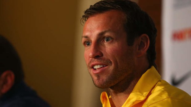 Newly re-appoionted Socceroos captain Lucas Neill speaks to the media.