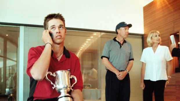 A young Aaron Baddeley (left) after winning the 1999 Australian Open, with parents Ron and Jo-Ann.